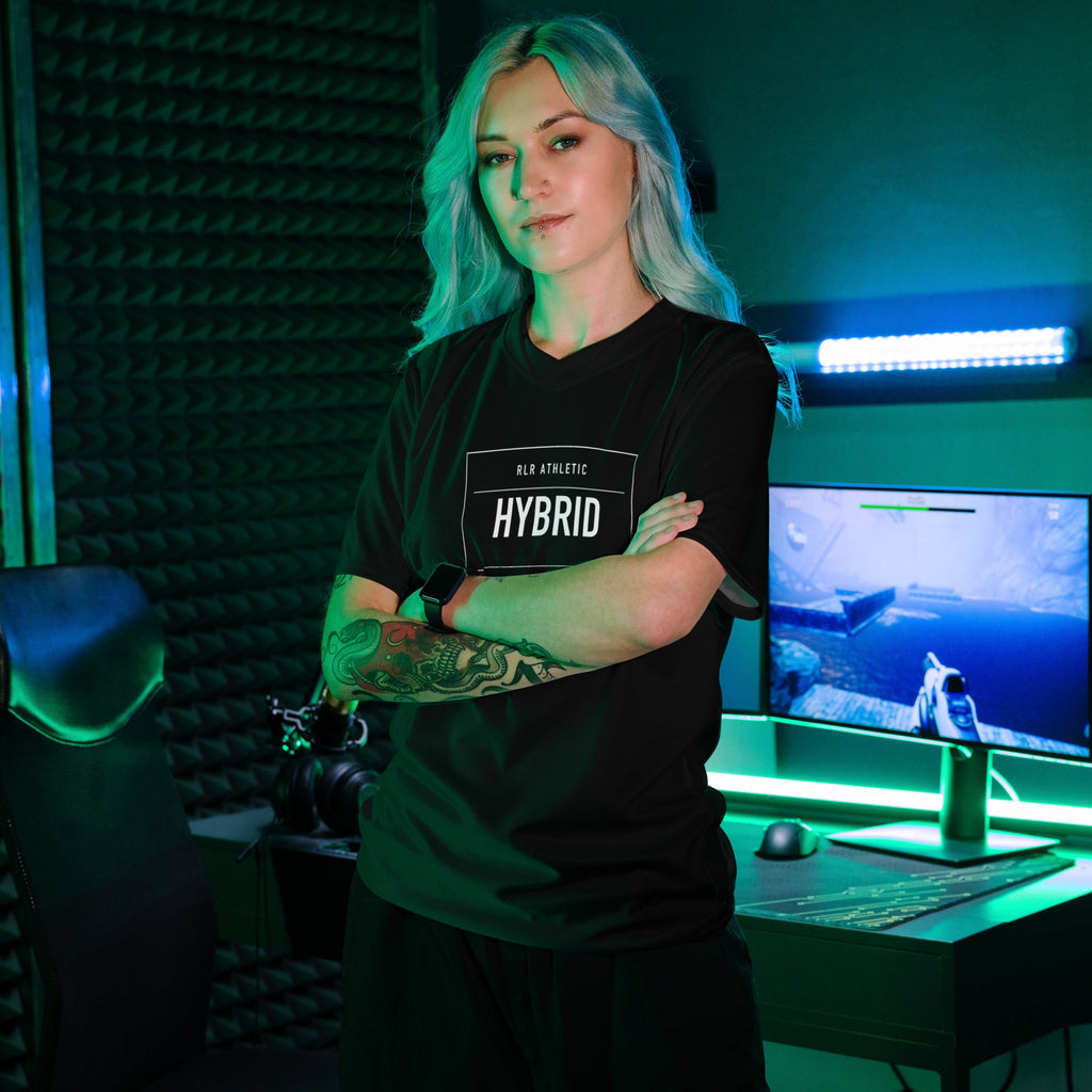 Athlete wearing the black RLR Race Division Jersey in a training studio