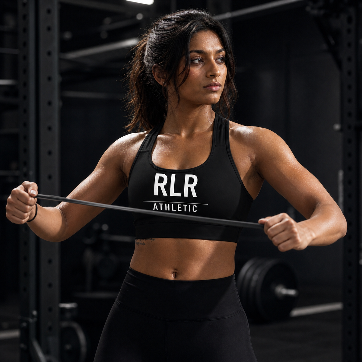 RLR Athletic Padded Racerback Sports Bra, black, side view, illustrative image